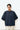 Unfeigned navy blue basic long sleeve t-shirt on model half body studio