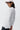 Unfeigned white basic long sleeve t-shirt with logo on model half body studio
