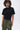 Unfeigned caviar basic t-shirt with logo on model half body studio