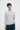 Unfeigned light grey melange crewneck merino knit on model half body