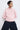Unfeigned rose crewneck merino knit on model studio