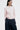 Unfeigned rose crewneck merino knit on model half body