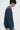 Unfeigned navy blue long sleeve oversized t-shirt on model half body studio