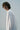 Unfeigned white long sleeve oversized t-shirt on model portrait studio