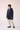 Unfeigned dark navy mini puffed coat WR front side on model worn studio
