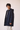 Unfeigned dark navy mini puffed coat WR 3/4 side worn on model studio