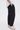 Unfeigned black smart pants technical N WR side on model half body