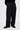 Unfeigned black technical city pants N WR on model half body
