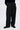 Unfeigned black technical city pants N WR on model half body studio
