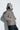 Unfeigned beige melange wool and silk beanie on model