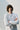 Unfeigned white basic long sleeve t-shirt on model half body studio