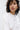 Unfeigned white basic long sleeve t-shirt with logo on model studio portrait