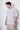 Unfeigned grey melange basic t-shirt on model half body studio