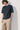 Unfeigned navy blue basic t-shirt on model full body studio
