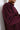 Unfeigned burgundy cashmere knit on model half body