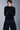 Unfeigned dark navy crewneck merino knit on model