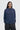 Unfeigned navy blue long sleeve oversized t-shirt on model half body studio