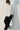 Unfeigned white long sleeve oversized t-shirt on model full body studio