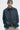 Unfeigned slate smart jacket N WR front on model 3/4 half body studio