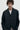 Unfeigned black technical blazer N WR on model portrait studio